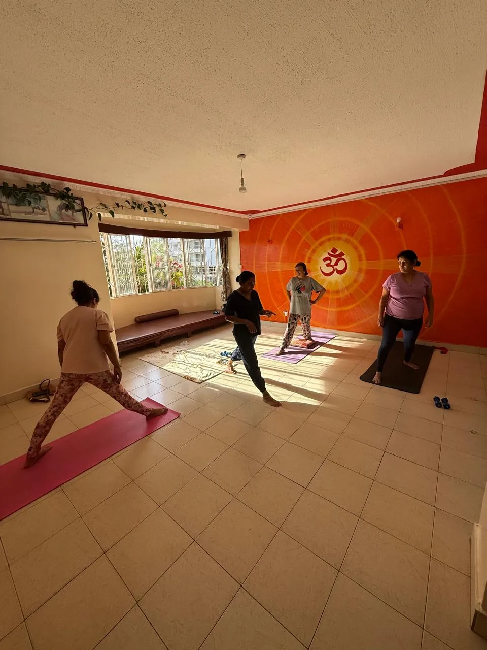 Indoor group yoga class at Pathak's Vitality