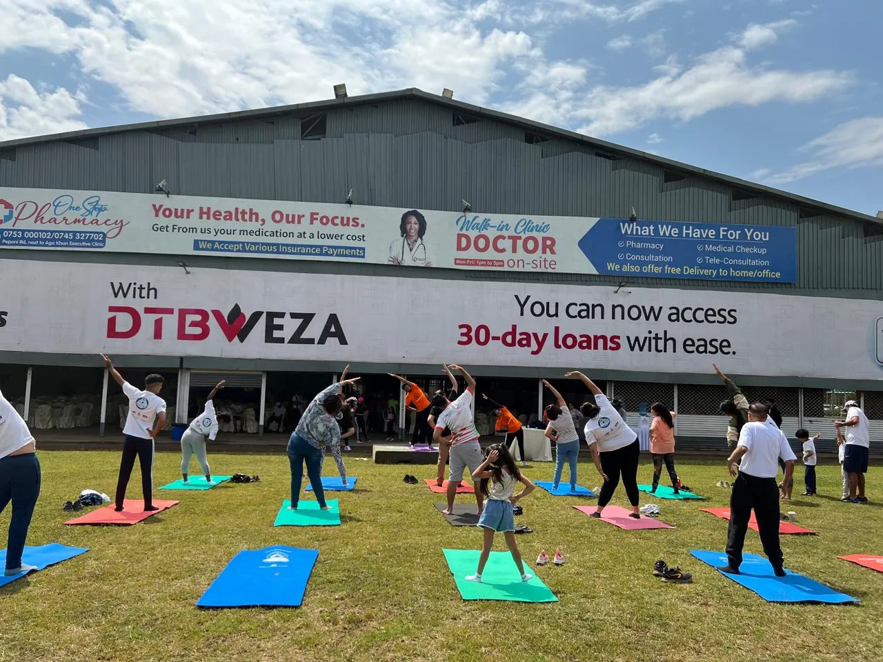 Outdoor community yoga class led by Pathak's Vitality